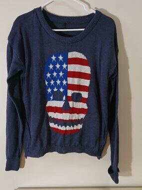 Poof! Sweater with flag skull - size tag removed but fits like a large women's